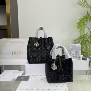 Quilted Leather Handbag with Top Handles and Charm Detailing