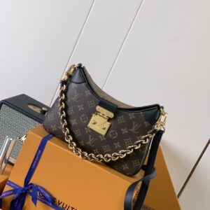 Monogram Canvas Handbag with Black Leather Accents and Gold-Tone Hardware