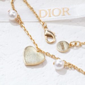 Heart - Shaped Bracelet with "CD" Logo and Pearl Accents