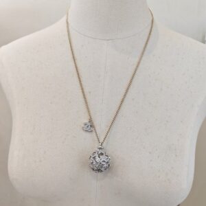 Necklace with Crystal - Encrusted Spherical Pendant and "CC" Logo Charm