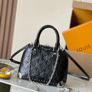 Alma BB Bag – Embossed Leather/Monogram Canvas with Signature Chain & Protective Studs (Luxury Mini Satchel)