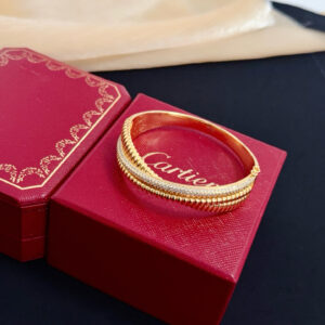 Gold-Tone Textured Bangle with Pavé Crystal Accent