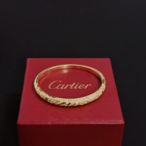 Gold-Tone Bangle with Intricate Pavé Crystal Filigree Design
