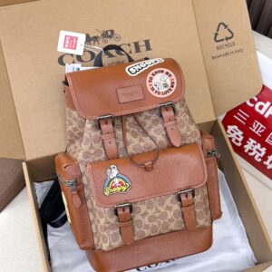 Peanuts Hitch Backpack in Signature Canvas with Snoopy Patches